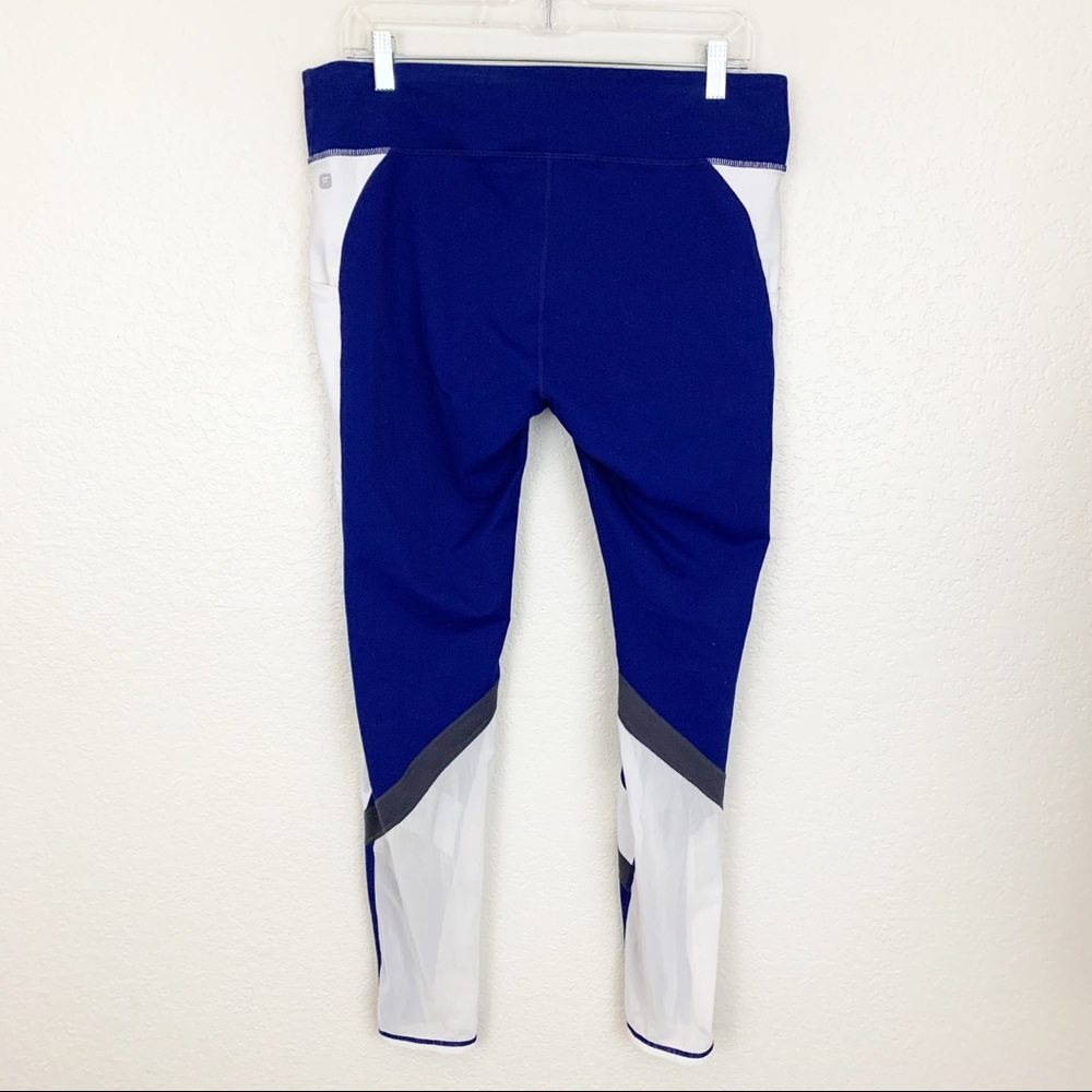 Fabletics Mid Rise Mesh Powerhold Blue Leggings - Picture 6 of 8